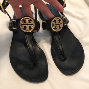 Tory Burch black sandals with gold accents